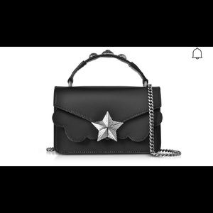 Les Jeunes Etoiles black leather Shoulder bag